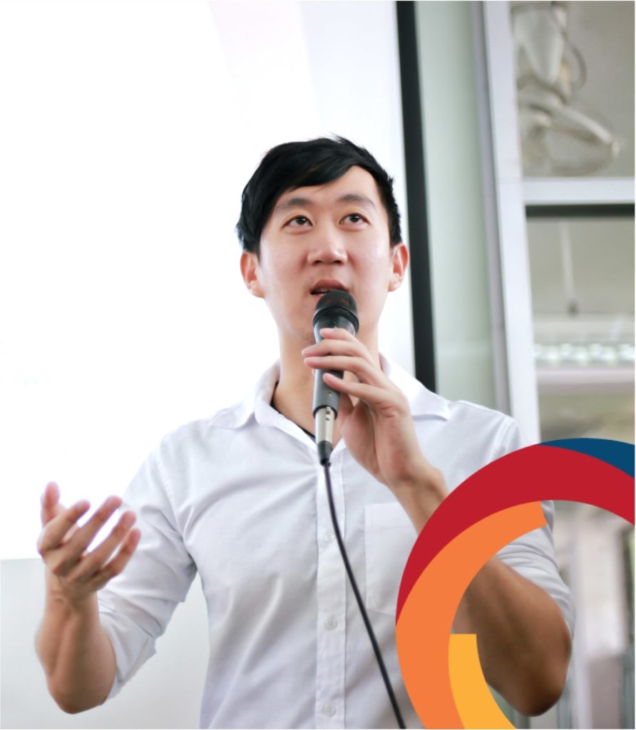 A man is speaking into a microphone